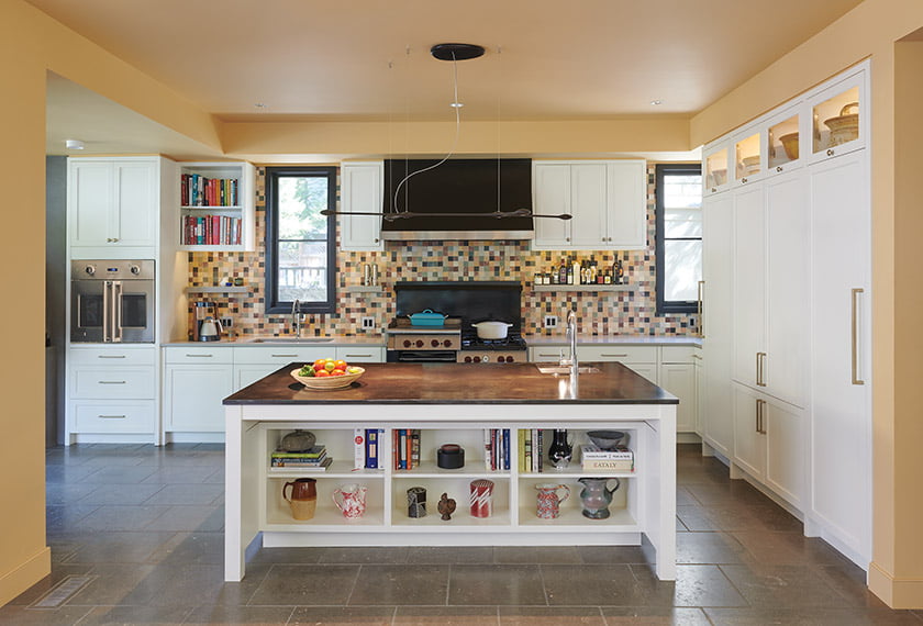 A cramped, outdated kitchen was replaced with a bright, open hub for cooking and entertaining.