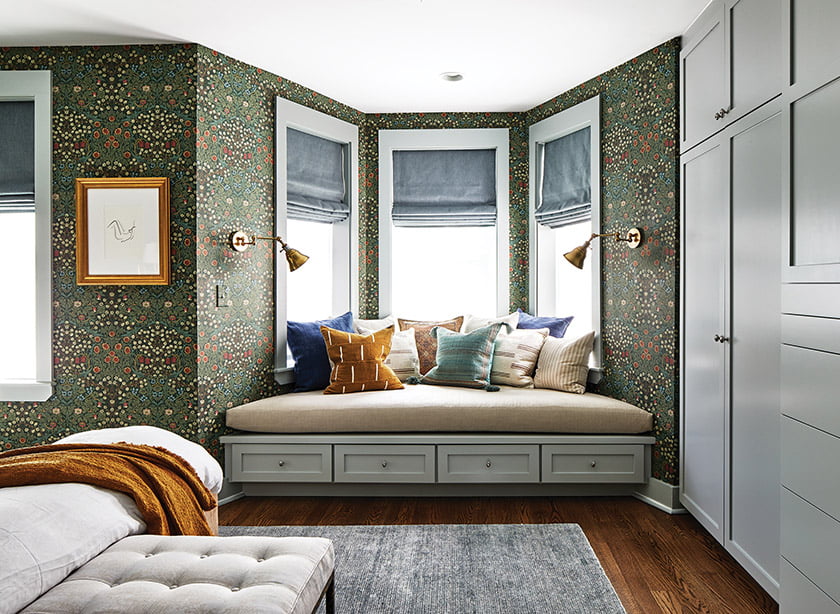 Feldman commissioned built-ins facing the bed and a deep window seat in the bay.