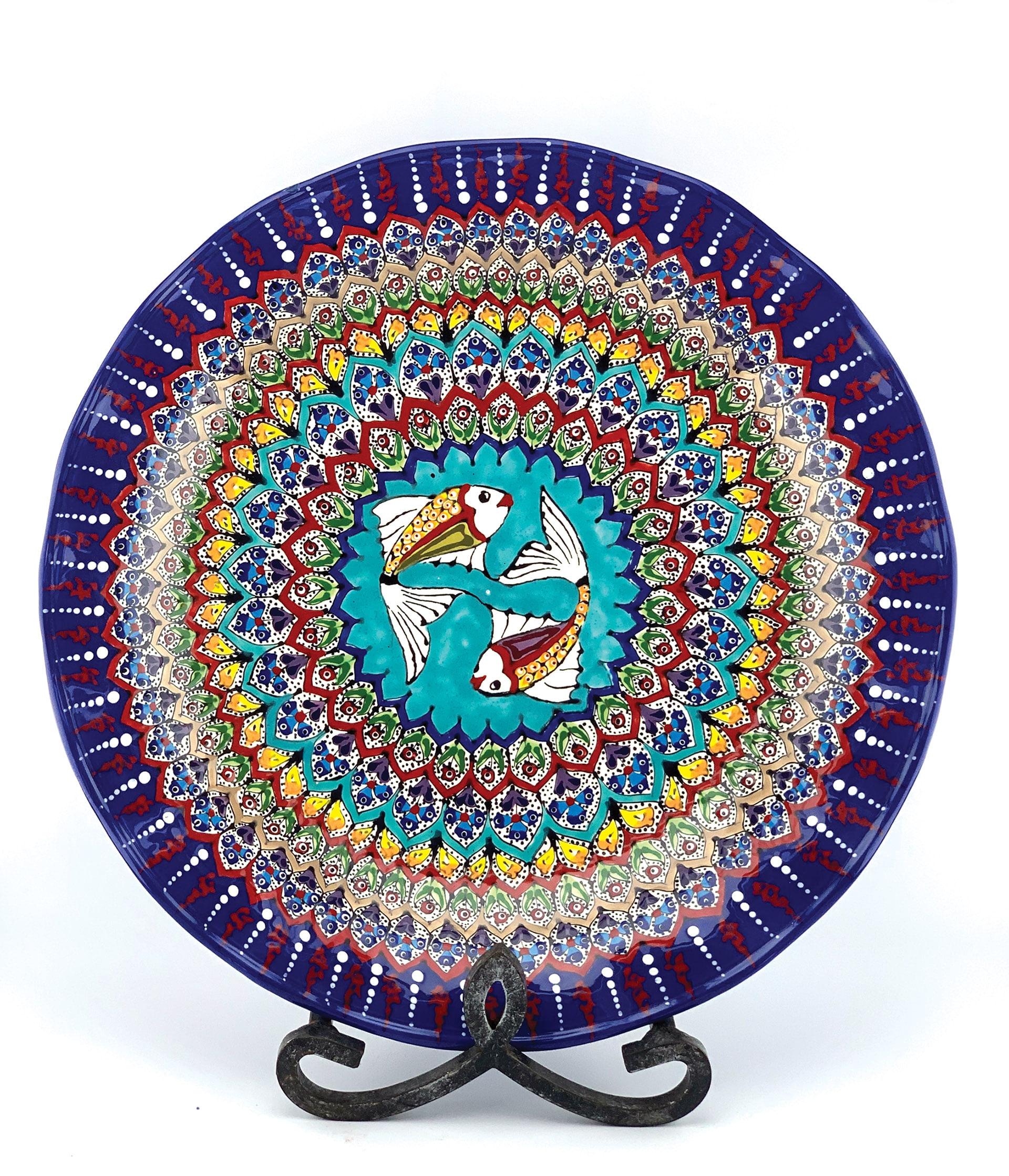 A plate festooned with fish revisits Kurdish rug motifs from the artist’s earliest memory.